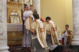 Father Walker at Mass