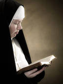 nun reading Bible